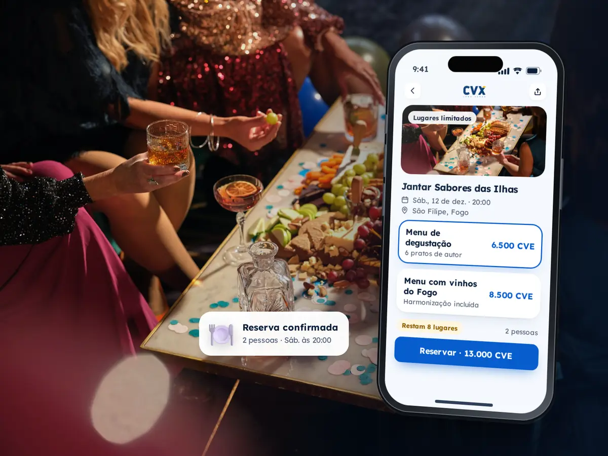 Tipos de Eventos 62 Telemóvel com a reserva de um jantar de degustação com lugares limitados, sobre a fotografia de uma mesa partilhada